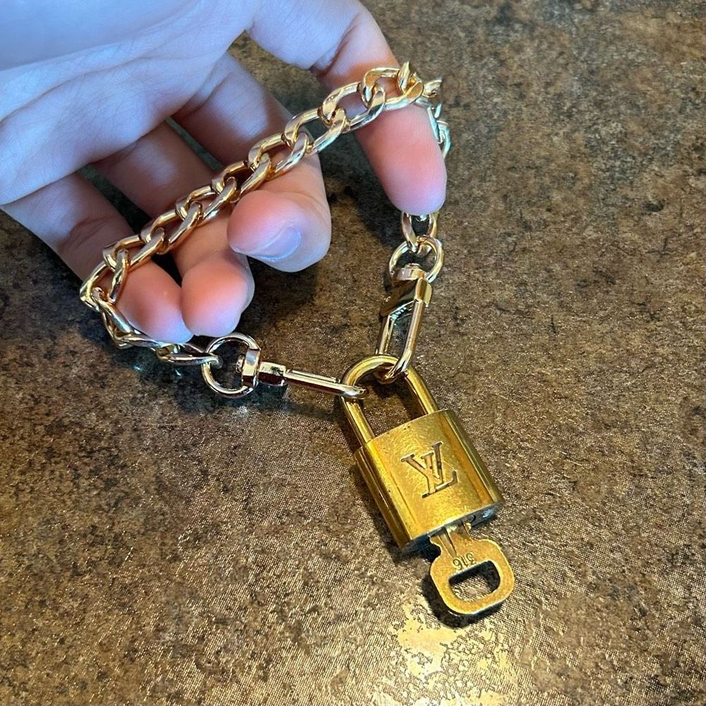Louis Vuitton #316 Lock and Key Gold Brass with new unbranded chain